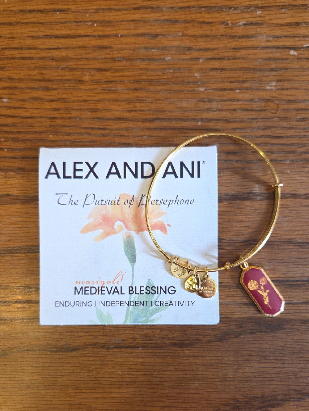Alex and Ani Gold Bangle Bracelet with Marigold Pink Charm - Medieval Blessing